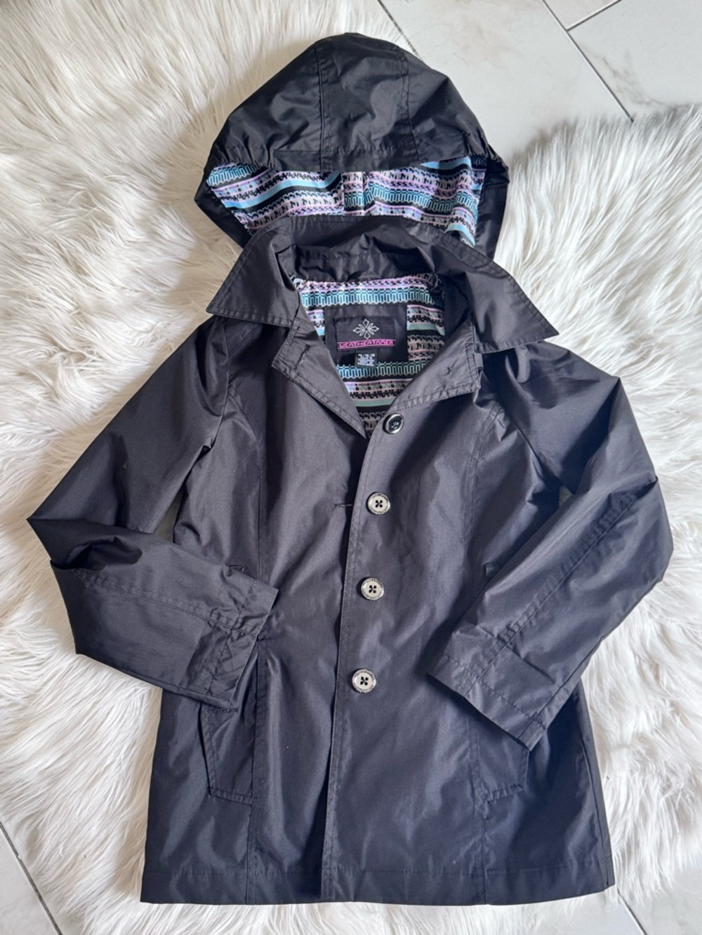 Girls Black Hooded Raincoat with Patterned Lining and Removeable Hood (10/12)